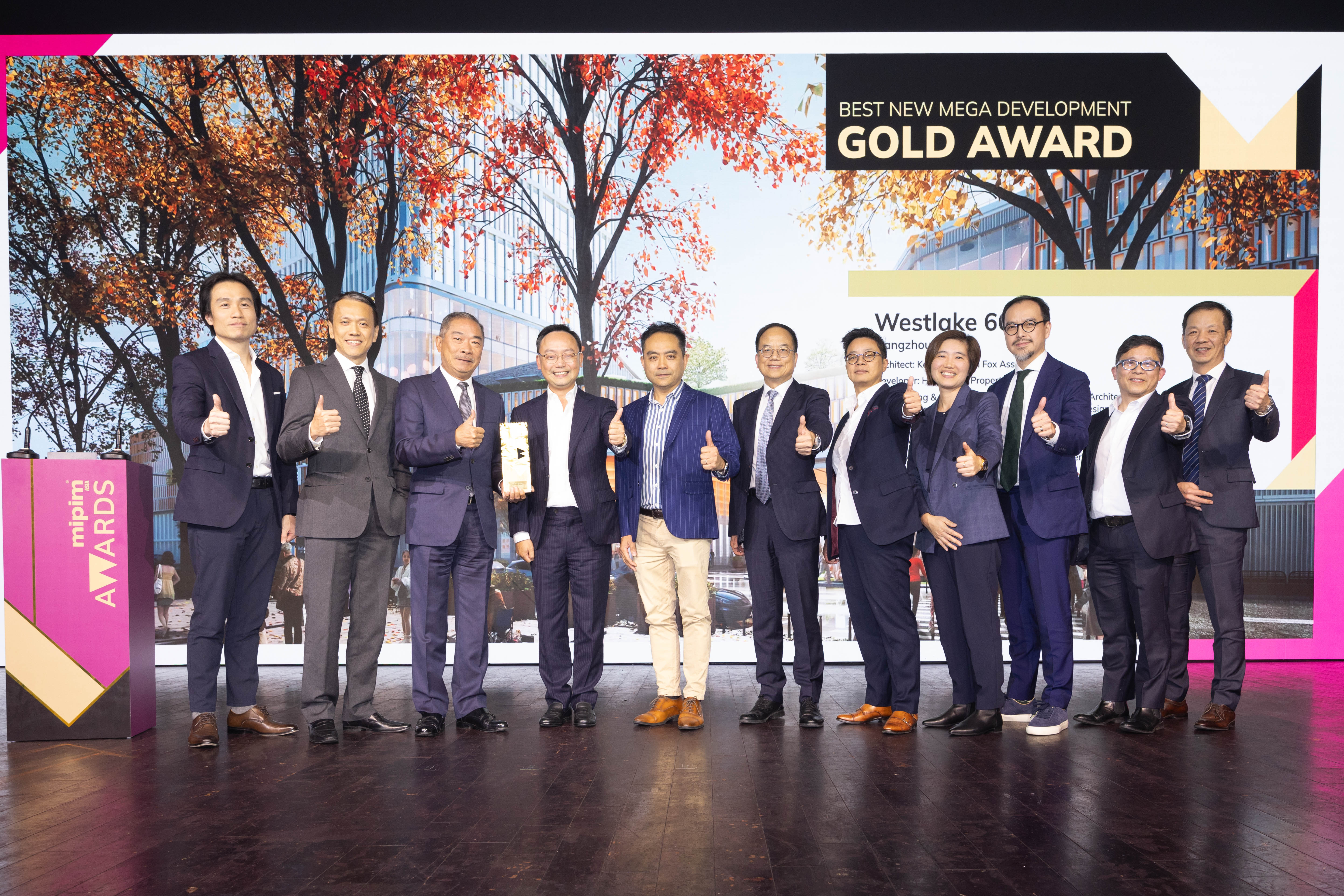 Mr. Kenneth Chiu, Executive Director and Chief Financial Officer (fourth left), Mr. Adrian Lo, Director  Project Management (third left), other executives of Hang Lung Properties and Westlake 66s design consultants receive the Gold Award in the Best New Mega Development category at the MIPIM Asia Awards 2023